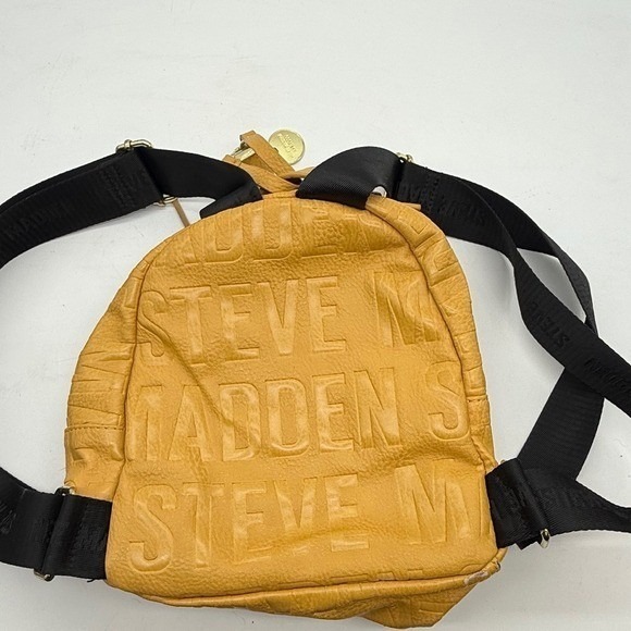 Steve Madden Yellow Embossed Logo Mini Backpack Mustard Tassel -corner peeling - Picture 5 of 11